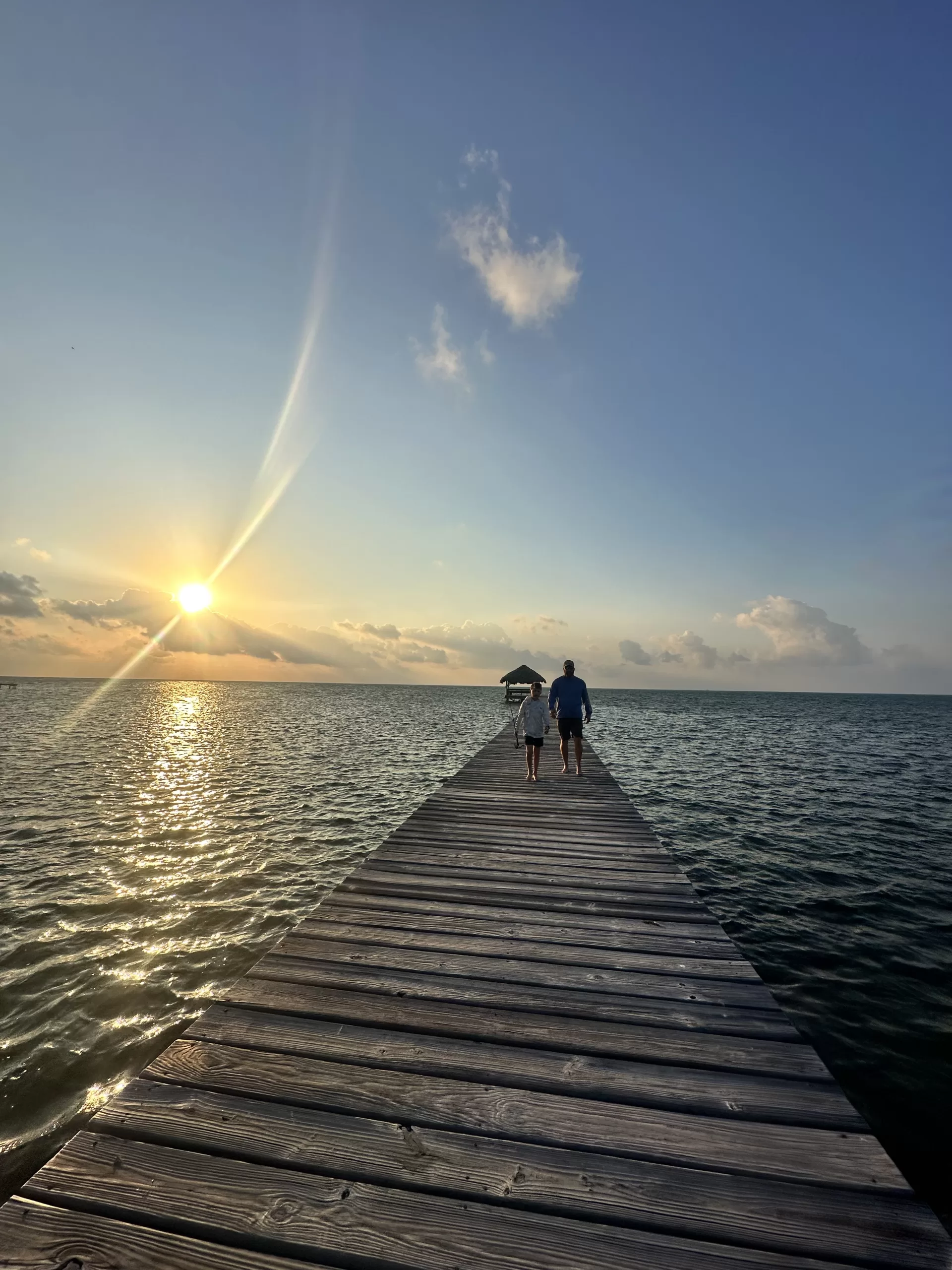 When heading to Belize, a fishing pole is on our travel essentials list.