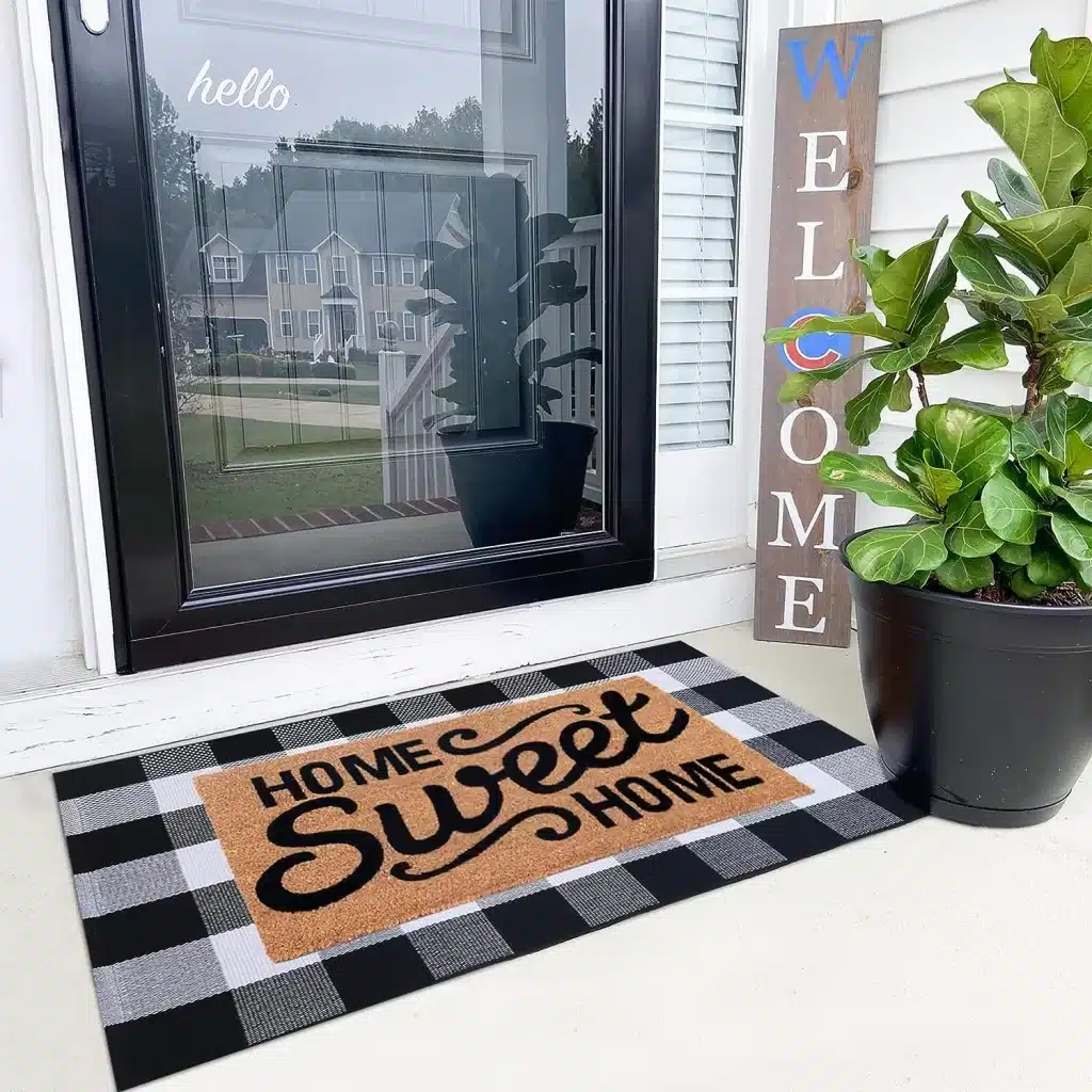 A mat and rug is a great idea when it comes to fall front porch decor. 