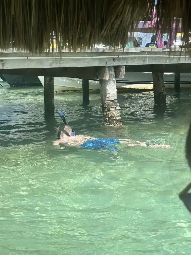 Snorkeling while waiting for lunch is perfect with family for your Caye Caulker, Belize itinerary. 