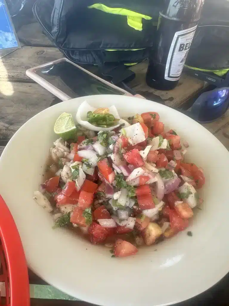 Eating ceviche at Secret Beach, which is one of the more popular things to do in San Pedro.