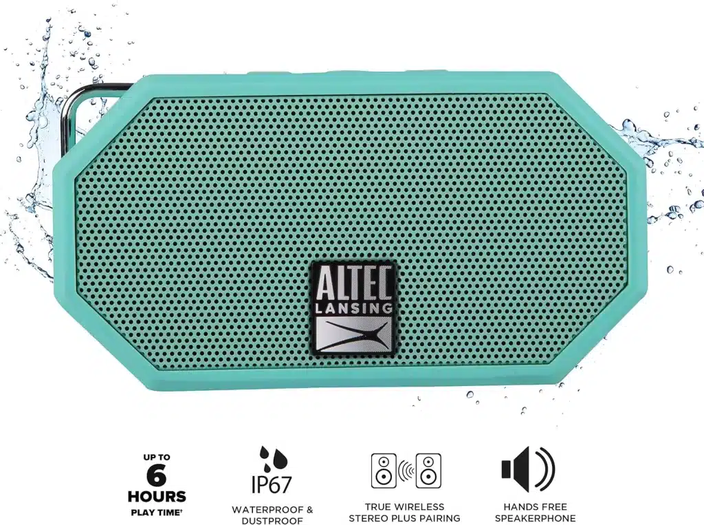 A portable bluetooth speaker is a great packing hack for the music lover. 