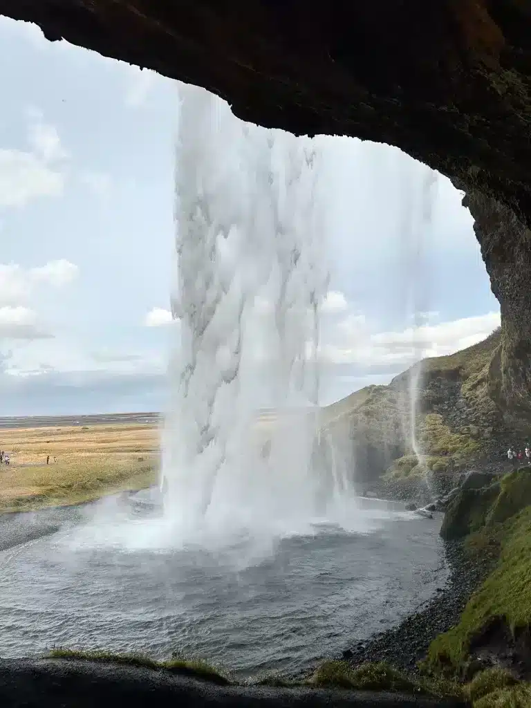 Seljalandsfoss is one of Iceland South Coast waterfalls that you can walk behind. 